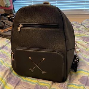 Boutique Backpack with matching key poof keychain.